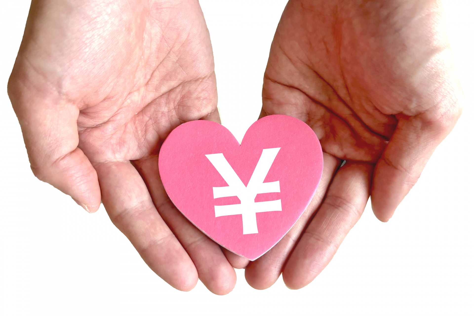 円マークのハートを包む両手
