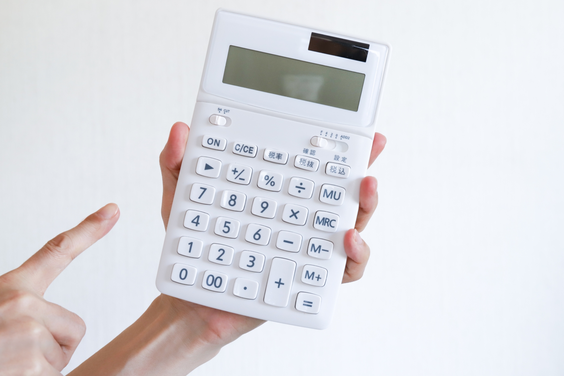 計算機を使う手元