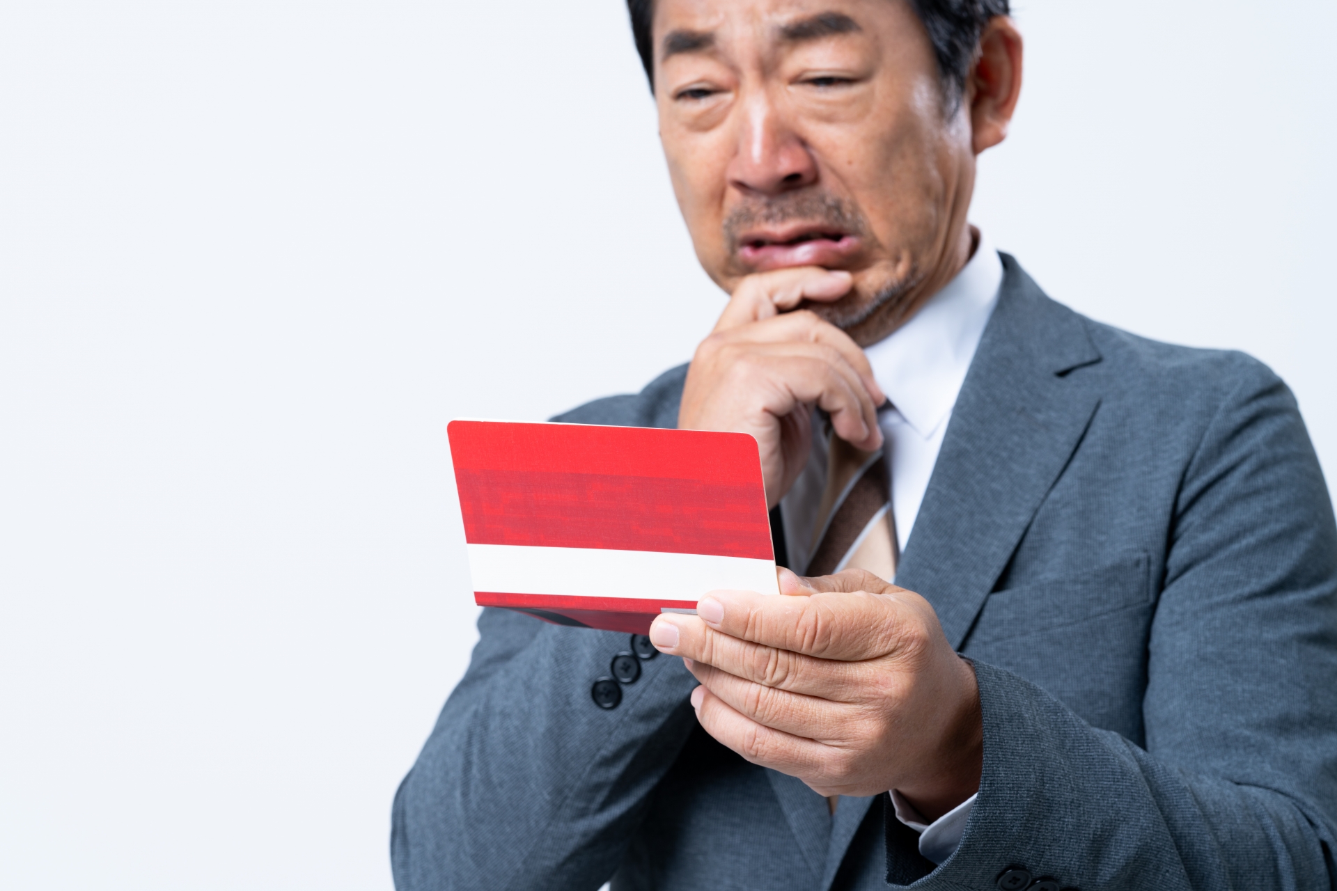 悩むミドルのビジネスマン