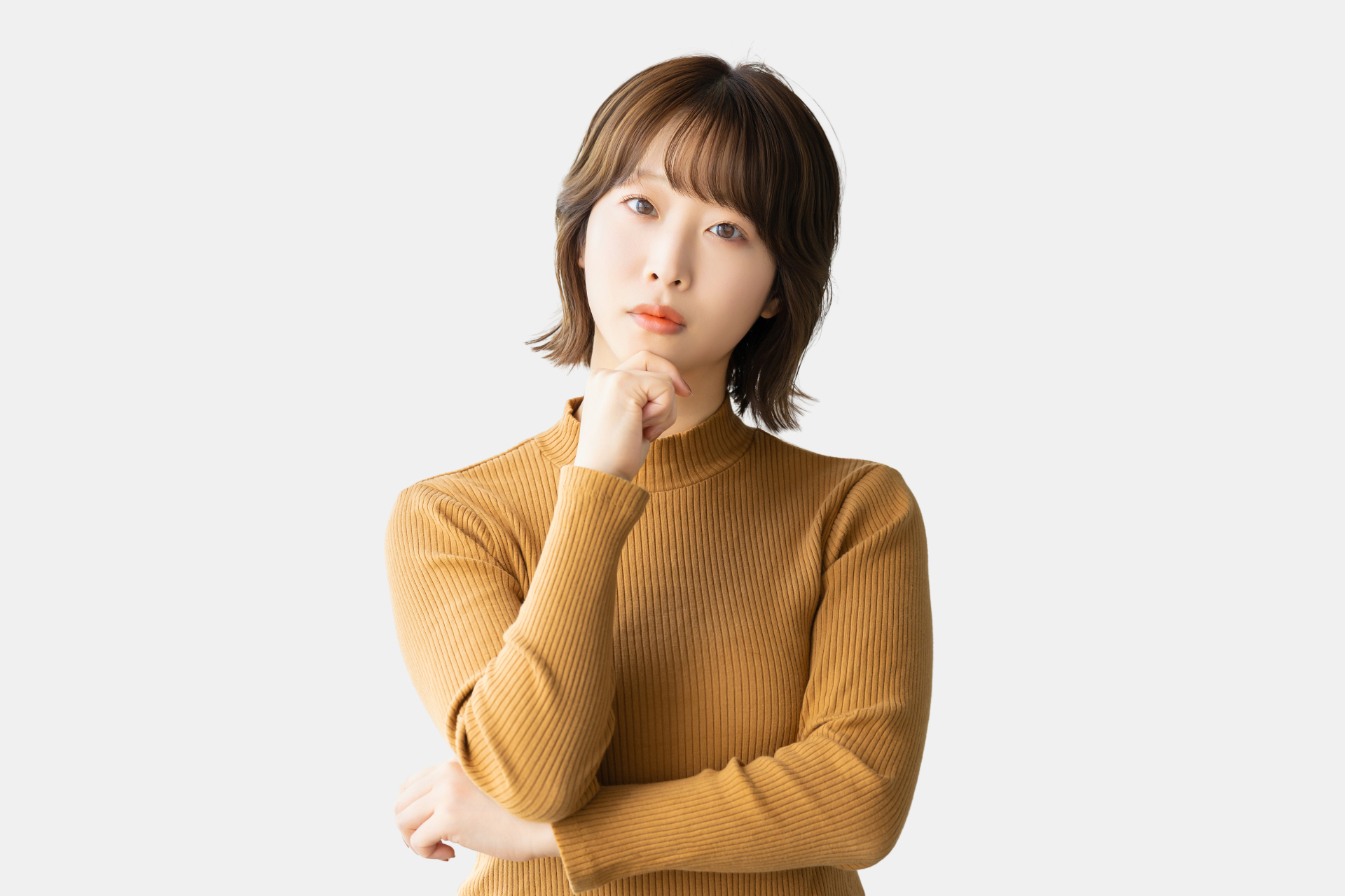 考えごとをする女性