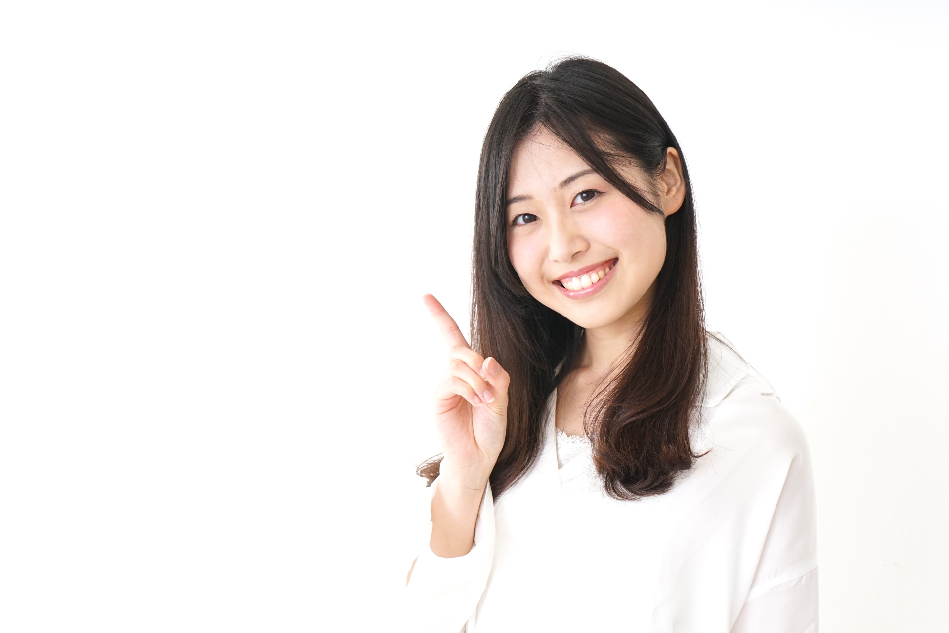 人差し指を立てている女性