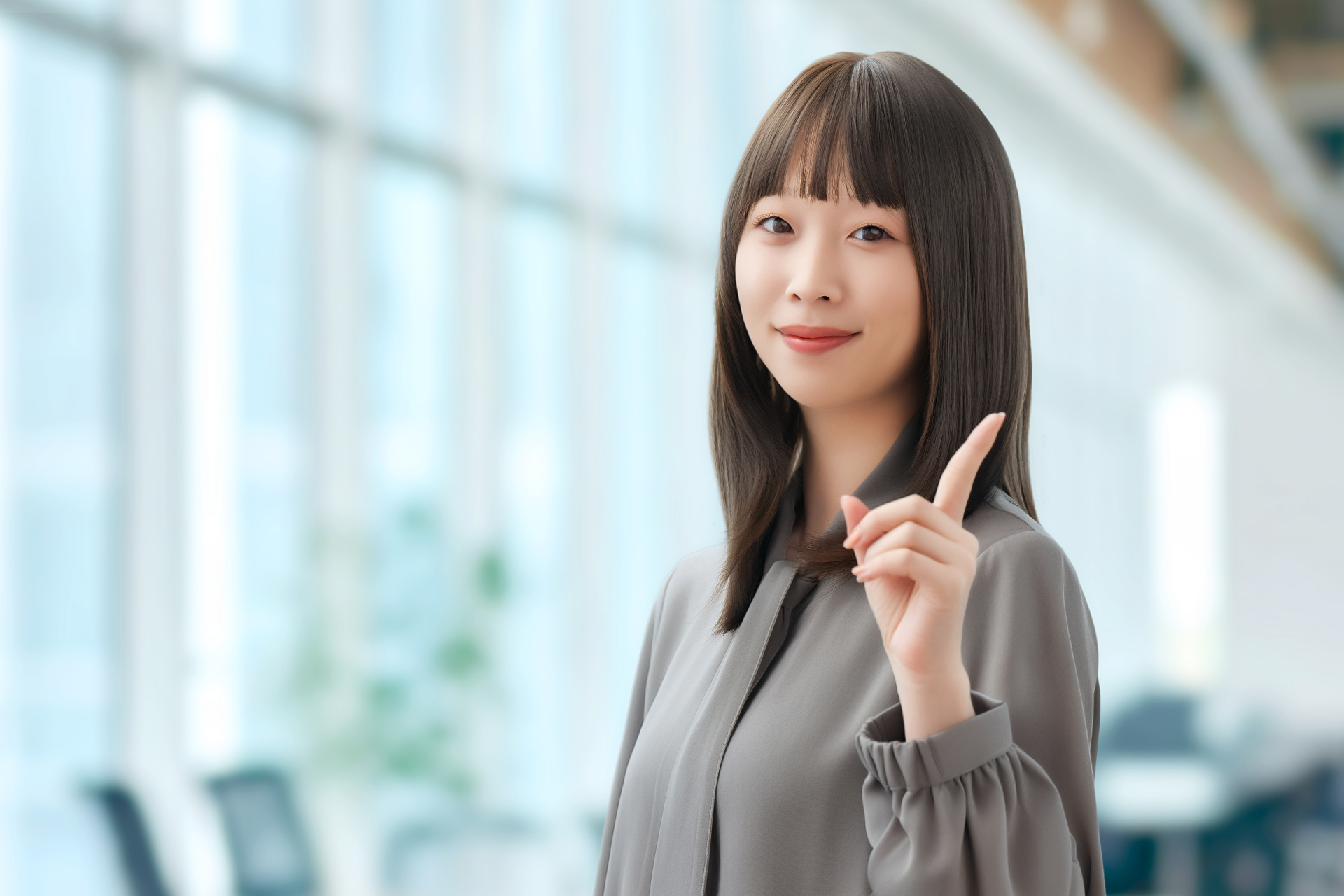 指を立てる若い女性