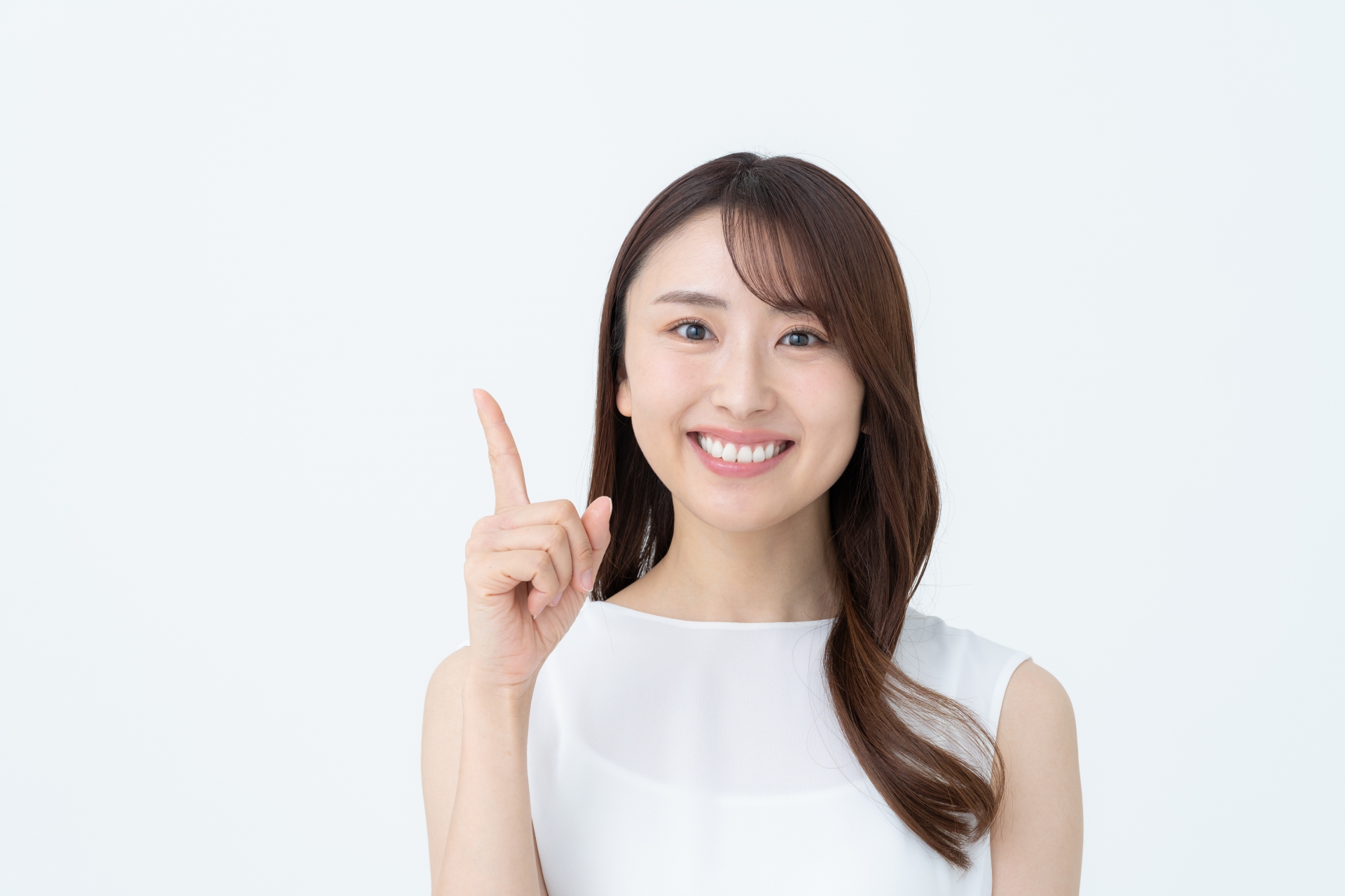 人差し指を立てている女性
